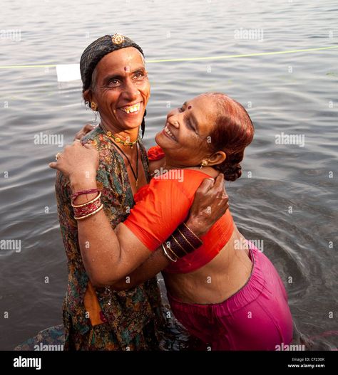 Download this stock image: Two women bathing in Ganges River, India - CF230K from Alamy's library of millions of high resolution stock photos, illustrations and vectors. Ganges River, Hot Dresses Tight, Women Bathing, Dresses Tight, Image Processing, Photo Image, High Resolution, Stock Images, Resolution