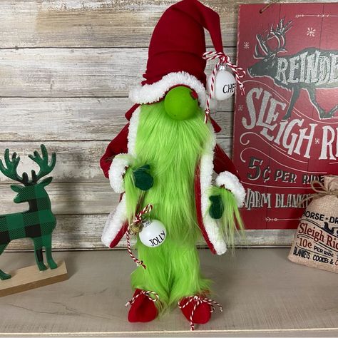 Bring The Festive Spirit Of Whoville Into Your Home With My Handmade Grinch Christmas Gnome! This Adorable Little Guy Is Perfect For Adding A Touch Of Sweetness To Your Holiday Decor. Made With Love And Care, This Unique Gnome Is Sure To Bring A Smile To Your Face And Delight To Your Christmas Celebrations. Red Cotton Flannel Machine Stitched Hat And Coat Trimmed With White Fluffy Yarn Trim. His Body, Beard And Legs Are Made With Soft Lime Green Faux Fur. He Has Posable Arms With Green Felt Hand Fireman Gnome, Christmas Gnome Craft, Christmas Gnomes Diy, Grinch Gnome, Gnome Decorations, Gnome Crafts, Grinch Crafts, Santa Gnome, Elf Shoes