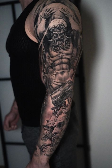 A Greek Mythology inspired full sleeve, realism tattoo done by Hans at Silverback Tattoo in Mol, Belgium. #greektattoo #greekmythologytattoo #realismtattoo #blackandgreyrealism #tattooinspiration #greektattooinspiration God Of Strength Tattoo, Best Realistic Tattoo, Greek Arm Tattoos For Men, Heracles Tattoo, Sleeve Tattoo Greek Mythology, Greek Mythology Tattoos Men, Greek Mythology Sleeve Tattoo, Greek Key Tattoo, Mythology Sleeve Tattoo