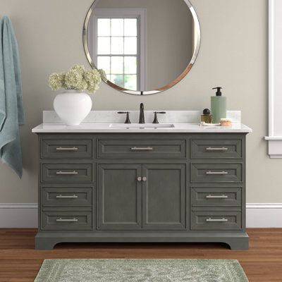 This single-bathroom vanity set features clean lines and plenty of drawer space for all your makeup, toiletries, and cleaning supplies. Its wide 60" design is made from solid wood in a neutral finish, and its surface is crafted from engineered stone in a Carrara white finish that complements your contemporary decor. The included undermount sink is made from ceramic, and it boasts a rectangular silhouette. Eight indented drawer fronts come with handles and they open up to reveal space for washclo Single Vanity Master Bath, Painted Vanity Bathroom, Half Bathroom Remodel, Wood Floor Bathroom, Ceramic Undermount Sink, Painted Vanity, Drawer Space, Single Sink Vanity, Engineered Stone