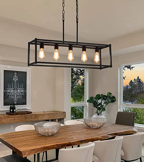 Dining Room Island Light Perfect Design：This rectangular 5-lights black kitchen island chandelier is finished with an open geometric metal frame and a modern industrial black finish and configured with five retro E26 bases, the simple linear pendant light fixture is the perfect addition to your home renovation. As an Amazon Associate I earn from qualifying purchases. Black Dining Room Light Fixture, Rectangle Kitchen Island, Modern Industrial Chandelier, Dinning Room Light Fixture, Modern Kitchen Pendants, Cage Light Fixture, Rectangle Kitchen, Dinning Room Lighting, Lights Over Kitchen Island