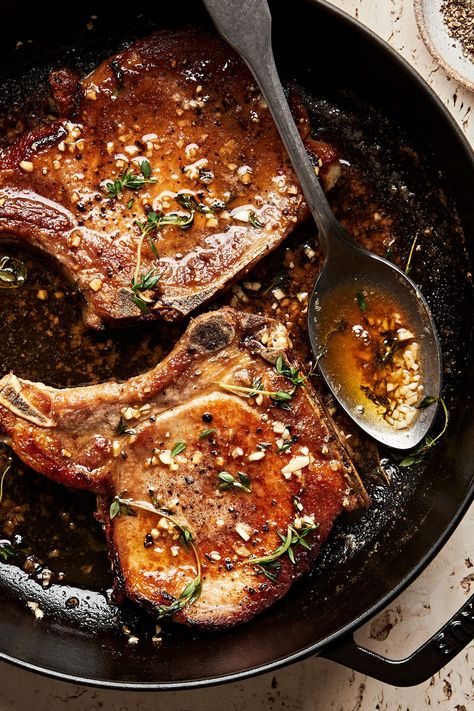 Garlicky butter sauce elevates humble pork chops in our company-worthy, weeknight-friendly garlic butter pork chop recipe. Tomahawk Pork Chop Recipe, Lamp Chops Recipe, Thick Pork Chop Recipe, Garlic Butter Pork Chops, Butter Pork Chops, Low Carb Pork Chops, Pork Chop Sauce, Healthy Pork Chop Recipes, Healthy Pork Chops