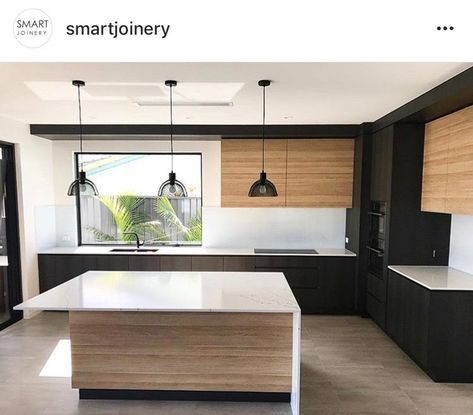 Charcoal White And Wood Kitchen, Black Kitchen With Window, White Kitchen Wood Island Black Hardware, White Kitchen With Walnut Accents, Black And Birch Kitchen, Modern Black And Wood Kitchen, Black White And Wood Kitchen Modern, White Black And Wood Kitchen Modern, Black And Wood Modern Kitchen