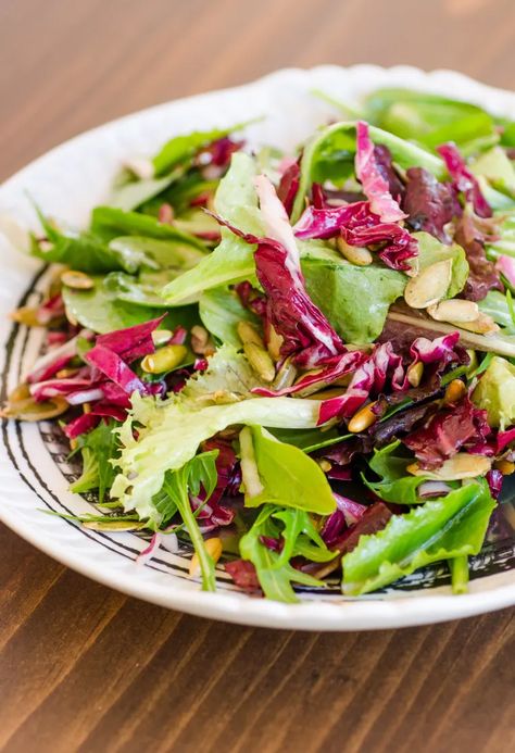 Quick Side Dish Recipe: Lemony Green Salad with Radicchio & Pepitas | Kitchn Thanksgiving Salad, Radicchio Salad, Sauteed Greens, Quick Side Dishes, Resep Salad, Lasagna Pasta, Lunch Appetizers, Turkey Dinner, Pizza Night