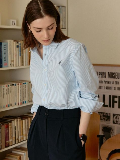 The basic striped shirts featuring the straight fit and comfortable silhouette. The oxford fabric and regular thickness create classic fit, and the logo embroidery added a stylish mood to the shirts. Style with various kinds of bottoms like trousers, denim jeans, or skirts to complete the classic outfits. - Blue stripe pattern throughout the shirts- Straight fit and comfortable silhouette- Logo embroidery at chest- Button closure detail at front- Two-button barrel cuffs Oxford Shirt Women Outfit, Oxford Shirt Outfit, Button Shirt Outfit, Oxford Shirt Women, Blue Stripes Pattern, Silhouette Logo, Shirts Style, Striped Shirts, Oxford Fabric