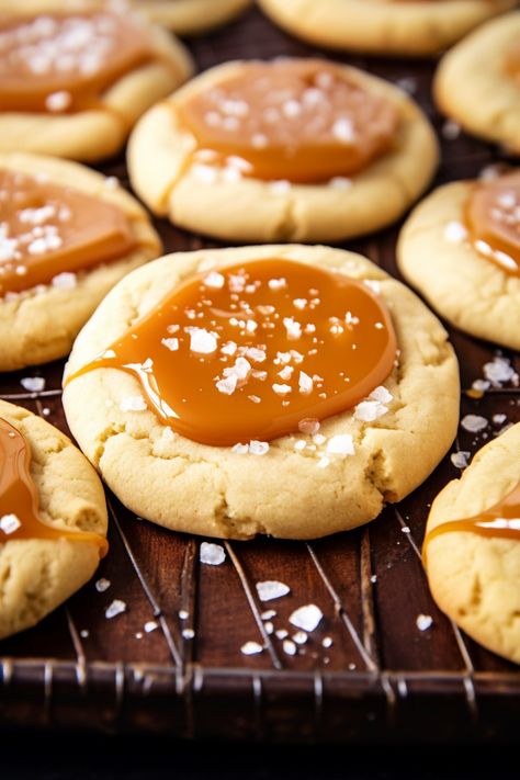 Delight in the lavish combination of soft sugar cookies, brimming with chewy salted caramel, and crowned with a touch of flaked sea salt. Indulgence redefined! Salted Caramel Cookies, Coconut Pecan, Best Bakery, Soft Sugar Cookies, Caramel Cookies, Crunchy Pecans, Sugar Cookies Recipe, Sweet And Salty, Color Combo