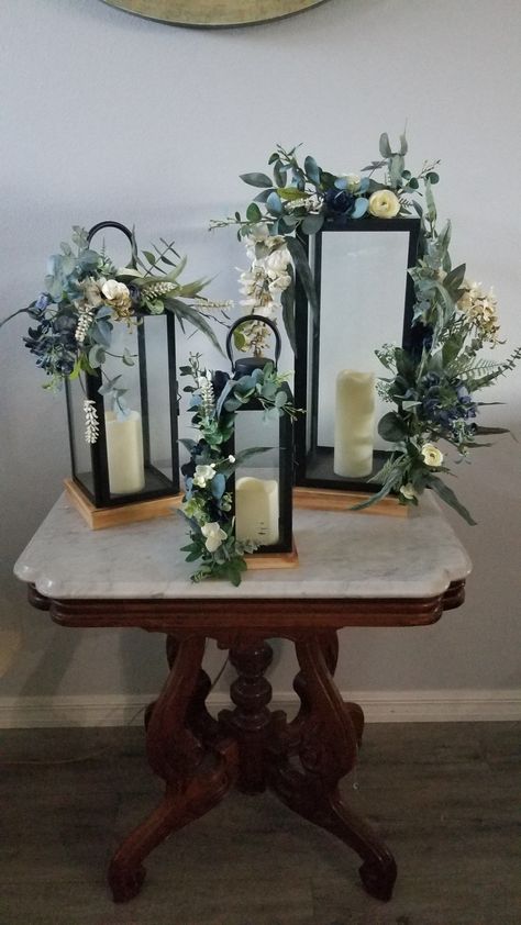 Lantern With Flowers Inside, Lanterns With Flowers Inside, Lantern Flower Arrangements, Simple Lantern Centerpieces, Wedding Centerpieces With Lanterns, Lantern Wedding Decor, Lantern Decor Living, Lanterns With Flowers, Floor Lanterns