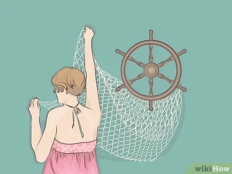 How to Hang a Decorative Fishnet (with Pictures) - wikiHow How To Hang A Fish Net On The Wall, Fish Net Wall Decoration, Beach Net Wall Decor, Fishing Net Decor Ideas, Decorating With Fishing Net, Fishnet Decorating Ideas, Fishnet Wall Decor Ideas, Fish Netting Decor Ideas, Decorating With Fish Netting