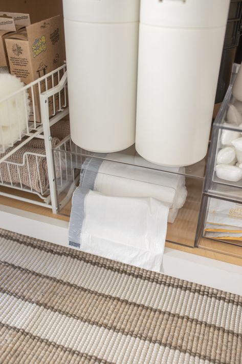 Keeping under my kitchen sink stocked is so important. It makes everyday tasks that much easier. Here are some of my favorite Napkin Storage Ideas, Trash Bag Dispenser, Trash Bag Holder, Teresa Caruso, Under Kitchen Sink, Napkin Storage, Clear Bins, Garage Organize, Multipurpose Cleaner