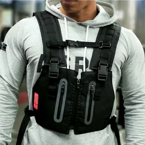 This ASRV Tactical Chest Rig Utility Vest is made with a durable blend of cotton and polyester, perfect for outdoor activities. With its adjustable straps and reliable buckles this vest is comfortable yet secure, giving you the confidence you need to take on any adventure. Techwear Vest, Mochila Edc, Tactical Chest Rigs, Evening Workout, Cycling Vest, Men Vest, Hunting Vest, Utility Vest, Outdoor Gym