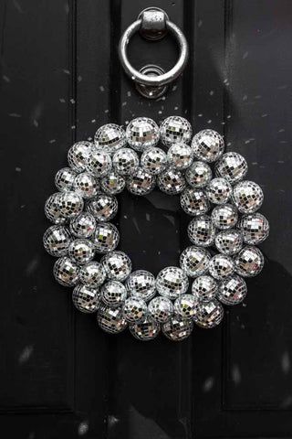 Christmas Wreath Hanging, Disco Ball Christmas, Silver Disco Ball, Bauble Wreath, Wreath Hanging, Beautiful Front Doors, Ball Wreath, Maximalist Interior, Quirky Home