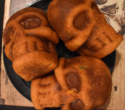 Halloween Cornbread, Skull Food Ideas, Skull Cornbread, Skull Muffin Pan Recipes, Cornbread Skulls, Skull Baking Pan Recipes, Meatloaf Skull Halloween, Skull Cakelet Pan Recipes, Spicy Cornbread