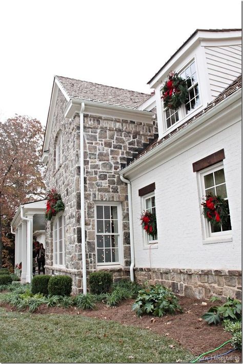 wreath flanked windows of beautiful stone exterior home Stone Exterior Houses, Stone Farmhouse, Old Stone Houses, Farmhouse Remodel, Casas Coloniales, Casa Exterior, Modern Farmhouse Exterior, Exterior Stone, White Brick