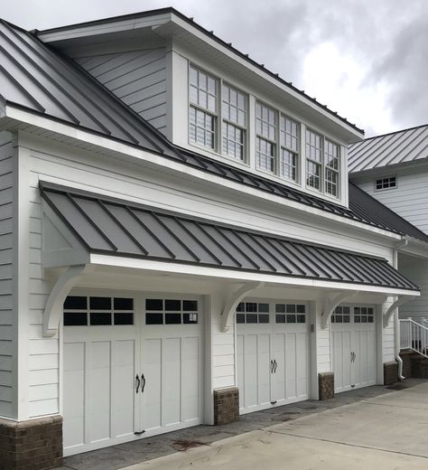 Three Garage Doors, Garage With Awning, Shed Roof Over Garage Doors, Garage Door Awning Metal Roof, Garage Side Door Entrance Ideas, Garage With Overhang Roof, Extending Garage Forward, Garage Door Awning Ideas, Metal Awning Over Garage Door