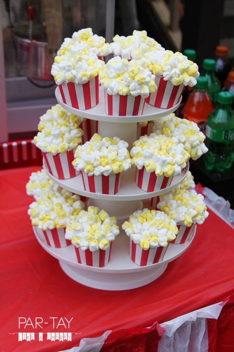 Circus birthday party feature Drive In Movie Party, Popcorn Cupcakes, Circus Party Decorations, Circus Birthday Party Theme, Party Popcorn, Carnival Birthday Party Theme, Movie Night Birthday Party, Movie Birthday Party, Movie Themed Party