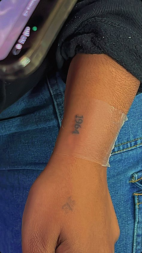 Birth Year Tattoo Black Women, Year Tattoo Number Wrist, Birth Year Tattoo Forearm, Year Rib Tattoo, Year Tattoo On Wrist, Wrist Year Tattoo, Moms Birth Year Tattoo, Year Tattoo On Hand, Fine Line Birth Year Tattoo