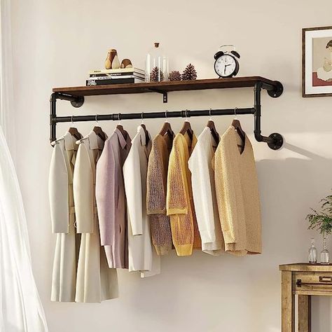 About this item
►Large Storage Space with Shelf - Wall mounted industrial clothing rack, made from 2.5cm diameter steel pipe with a width of 100 cm. This retro clothes rail can hold many clothes with 30kg/66lbs weight capacity. This coat rack features a shelf perfect for holding your collectibles, photo frames, statues, small vases or accent pieces. While the clothing rail can be used for hanging your keys, umbrellas, coats, hats or scarves.
►Multifunction - Innovative storage and hanging space combined, this hanging clothes rails aimed to create a bespoke space wherever you need to hang, store or display. This retro style is perfect for home, any retail space from shops, storerooms and kitchens to small alcoves and cupboards to help you make the most of your space, providing a durable, st Industrial Clothing Rack, Pipe Clothes Rack, Hanging Clothes Rail, Hanging Clothes Racks, Space Saving Hangers, Garment Rack, Industrial Pipe, Clothes Rail, Hanging Clothes