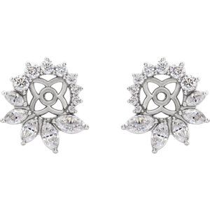 these white gold or platinum earring jackets make any diamond stud earring pop.  this style features marquise and round diamonds to surround your post earring.