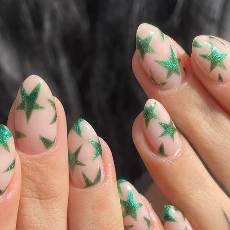 PREVIOUSLY HARD AS NAILS STUDIO 💖 on Instagram: "Okay sooo green glittery stars aren’t just a thing for Christmas, they a spring thang too! Using @the_gelbottle_inc ‘Ivy’ Detailed mani by Caitlin #thegelbottleinc #starnails #glitterynails #almondnails #HANSCaitlin #birminghamnails" Christmas Confetti Nails, Star Nails Christmas, Glitter Stars Nails, Whimsical Christmas Nails, Green Stars Nails, Subtle Christmas Nails Green, Star Christmas Nails, Cute Christmas Nails Green, Christmas Nails Stars