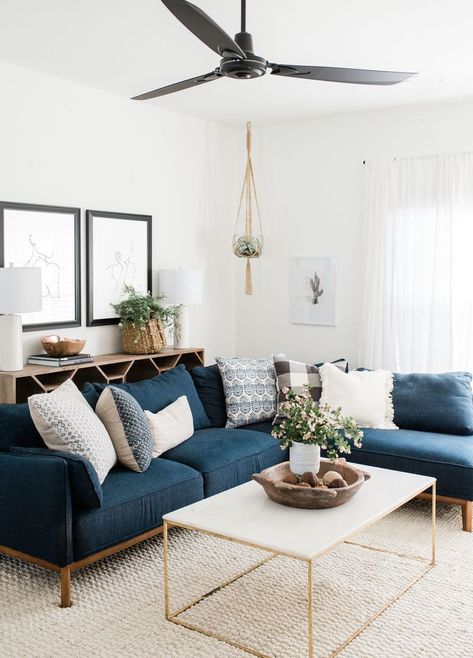 modern boho living room decor with blue velvet sofa and gold coffee table, navy sofa and boho pillows in living room design Anastasia Casey, Modern Boho Living Room Decor, Furnitur Ruang Keluarga, Modern Boho Living Room, Boho Living Room Decor, Trendy Living Rooms, घर की सजावट, Blue Living Room, Design Hotel