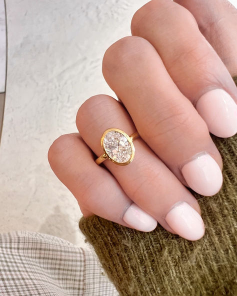 Elegant 18ct Yellow Gold Engagement Ring featuring a Stunning 1.5ct Oval Lab Grown Diamond in a Bezel Setting - Perfect Blend of Luxury and Vintage vibes 🌟




💍 #EngagementRing #YellowGold #LabGrownDiamond #BezelSetting #LuxuryJewelry #OvalDiamond #GoldRing" Yellow Diamond Oval Ring, Gold Ring With Oval Diamond, Gold Bezel Engagement Ring, Gold Oval Engagement Ring, Gold Band Engagement Rings, Dimond Ring, Valentine Collection, Bezel Set Engagement Ring, Oval Cut Ring