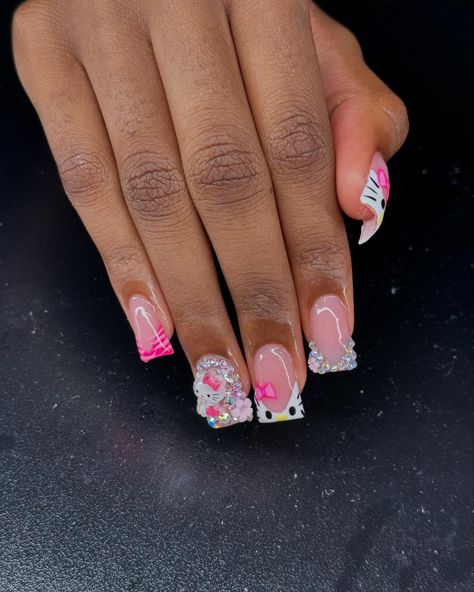 Hello Kitty Process Post 🎀🌸🦓 ~ ~ ~ #explore #explorepage #hellokitty #hellokittylover #hellokittyaddict #nails #nailtech #floridanailtech #nailart #naildesign #nailinspo Blinged Out Nail Sets, Birthday Nails Hello Kitty, Short Hello Kitty Nails With Charms, Hello Kitty Acrylic Nail Designs, Hello Kitty Junk Nails, Short Baddie Nail Ideas, 111 Nails, Hello Kitty Short Nails, Nails Acrylic Hello Kitty