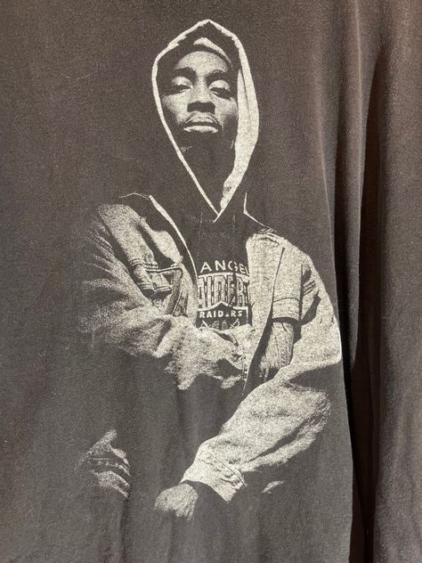 Band: Tupac  Size:  24" pit to pit  &      24" collar to bottom  Colors: black Condition: excellent  **all of our shirts are PRE-OWNED and may contain normal wear, fading, stains or imperfections, holes, tears, loose or missing threads. We will do our best to point out significant issues. Thank you for looking!! #tshirt #fashion #tshirtdesign #tshirts #style #clothing #streetwear #shirt #design #apparel #love #clothes #clothingbrand #jeans #art #used #onlineshopping #shopping #tee #like #tees #t Streetwear Shirt Design, Tupac Tee, Streetwear Tshirts, Jeans Art, Clothing Streetwear, Tshirt Fashion, Tupac, Fashion Streetwear, Shirt Design