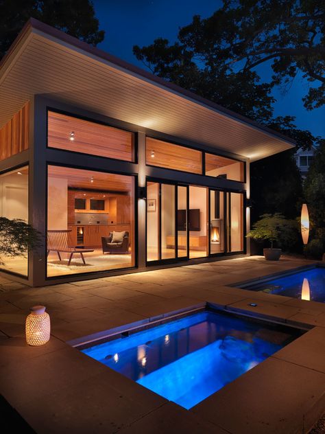 This modern guest house has a sloped roof with plenty of glass windows, which are a strong contrast to the original shingle style home on the property. Backyard Pool House, Pool House Design, Pool Guest House, Modern Pool House, Backyard Guest Houses, Guest House Plans, Relaxation Tips, House With Pool, Pool House Designs