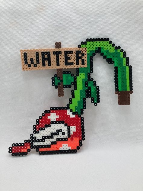 Handmade Mario Brothers Piranha Plant Perler Bead Pot Deco 8in Width 7in Height Shenron Perler Beads, Mario Fuse Beads, Hama Beads Gifts Ideas, Popular Perler Bead Patterns, Hollow Knight Perler Beads, Hamilton Perler Beads, Skeleton Perler Beads, Perler Bead Patterns Big, Fall Perler Bead Patterns