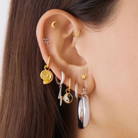 Mix Metal Ear Piercing, Mixing Gold And Silver Earrings, Silver And Gold Mixed Earrings, Ear Piercings Gold And Silver, Gold And Silver Jewelry Together Ear, Ear Piercing Ideas Mixed Metals, Mixed Jewelry Metals Ear, Mixed Gold And Silver Ear Piercings, Gold And Silver Ear Piercings