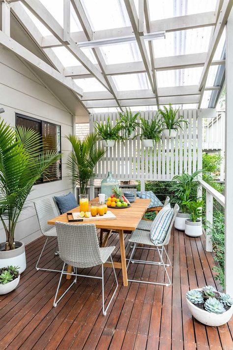 Before & after: An incredible patio transformation | Better Homes and Gardens Patio Transformation Before And After, Back Porch Before And After, Barbecue Area Ideas, Carport Makeover Outdoor Spaces, Tiny Courtyard, Carport Makeover, Patio Transformation, Porch Fence, Courtyard Patio