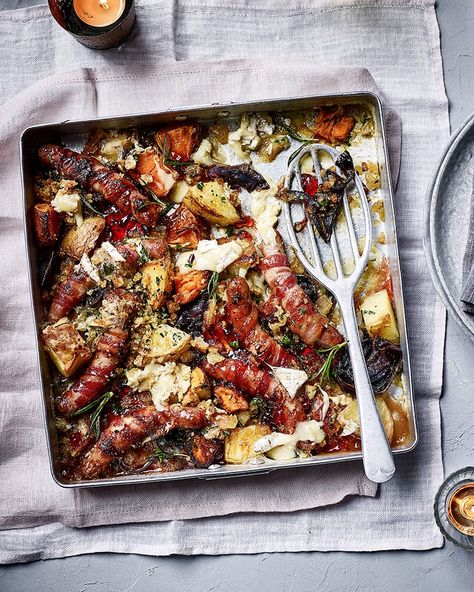 This easy pigs-in-blankets traybake is full of Christmassy flavours: brie, redcurrant jelly and sweet potatoes with bacon-wrapped chipolatas. Easy Chicken Leg Recipes, Air Fryer Chicken Meatballs, Pigs In Blankets, Budget Christmas, Christmas Side, Sausage Dishes, Tray Bake Recipes, Delicious Magazine, Xmas Food