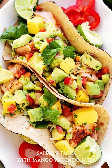 Mango Tacos, Salmon Tacos Recipe, Mango Salmon, Seasoned Salmon, Garlic Butter Salmon, Mango Avocado Salsa, Salmon Tacos, Salmon Fillet, Mango Avocado