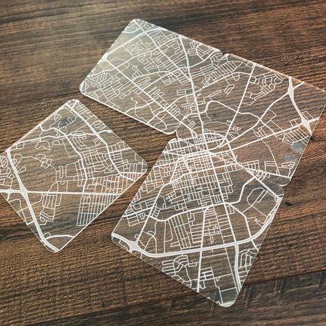 "This set of 4 square acrylic coasters contains the street map of your choice engraved on each one. Put the 4 coasters together like a puzzle to form the full map! A beautiful display piece as well as a practical table saver! Each coaster measures 4x4\" and .18\" thick. **Please include a city, address, intersection, or point of interest in the personalization section as a center point of your map. You may choose to receive a proof of the map engrave before it is printed for an extra $2." Puzzle Coasters, Acrylic Engraving, Coasters Design, Etched Acrylic, Acrylic Coasters, Map Signs, Map Puzzle, Interactive Walls, Laser Cut Wood Crafts