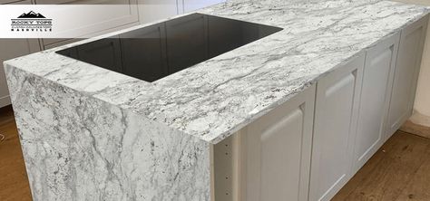 Stunning Elegance of Thunder White Granite Countertops https://rockytops-nashville.com/stunning-elegance-of-thunder-white-granite-countertops/ Thunder White Granite Countertops, Thunder White Granite, River White Granite, White Granite Countertops, Black Veins, Leather Granite, Custom Countertops, White Granite, Stone Feature