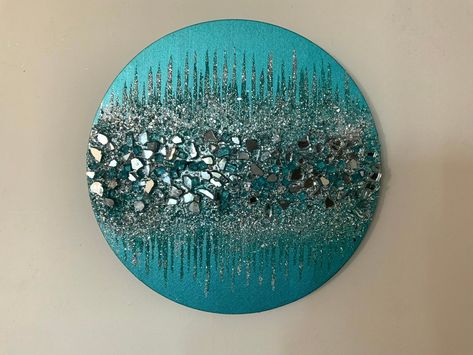 Teal glitter glass painting, Teal glitter glass art, Teal painting, Teal glitter painting, Teal home decor, Teal abstract art, Teal decor This dazzling silver and teal painting is full of sparkle. This piece is made with a combination of teal, and silver material ~Free shipping ~Ready to hang ~Comes in multiple sizes  ~Please be sure to measure your desired area and select the appropriate size from the drop-down menu To view more of my paintings, click here: https://www.etsy.com/shop/LavRender Teal Craft Room, Teal Abstract Art, Teal Bedroom Decor, Teal Bathroom Decor, Teal Painting, Glitter Painting, Teal Home Decor, Artsy Painting, Teal And Silver