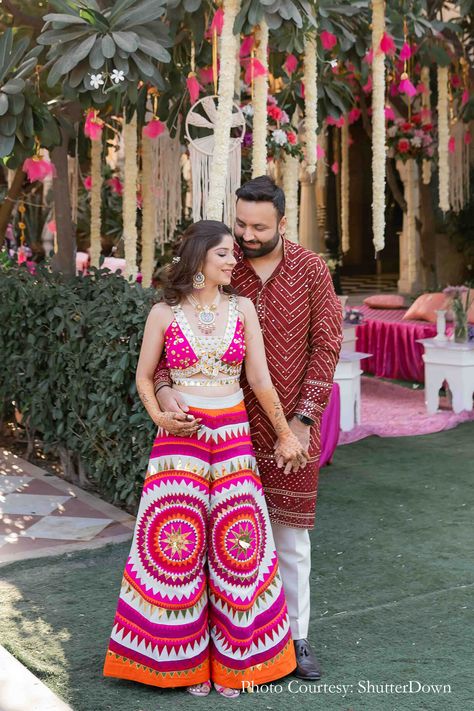 Nikita Vakadkar and Ashray Arora, Shahpura House, Jaipur | WeddingSutra Couple Mehendi Outfits, Mehndi Outfit For Couple, Haldi Ceremony Outfit Couple, Couple Haldi Outfit Ideas, Sangit Outfit Ideas For Bride, Mehendi Night Outfit, Mehendi Bride Outfit, Bride Mehendi Outfit, Haldi Couple Outfits