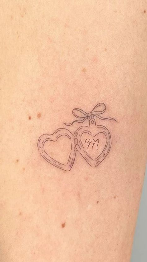 J In A Heart Tattoo, Heart Charm Tattoo, When Emma Falls In Love Tattoo, Cute Tattoos Arm, Bf Tattoo Ideas, Made In Love Tattoo, Heart Tattoo With Initials, The Notebook Tattoo, Bridgerton Tattoo