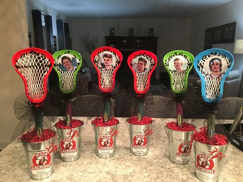 Lacrosse centerpieces. Container from At Home, sticks are Pool Lax from Target. Lacrosse Bouquet, Lacrosse Centerpiece Ideas, Lacrosse Banquet Centerpieces, Lacrosse Centerpieces, Lacrosse Birthday, Baseball Banquet, Lacrosse Party, Sports Centerpieces, Banquet Centerpieces