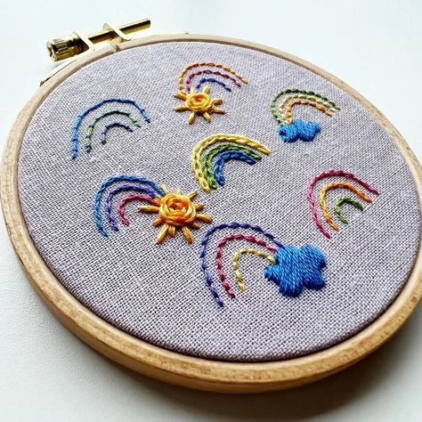 LEARN HAND EMBROIDERY RAINBOWS AND SUNSHINE - LEARN OR PRACTICE 7 EMBROIDERY STITCHES! Roseanna Diggs created this Happy Rainbows Pattern, Rainbows and Sunshine, to teach beginners how to embroider with a fun design. Just add scissors! Are you crafty? Can you follow instructions? Then you can do this! Every step of the pretty project is nicely explained in the printed instruction booklet. It includes many color photographs and stitch diagrams, as well as instructions. Also includes a QR code to Rainbow Hand Embroidery, Embroidery Rainbow Pattern, Embroidered Disco Ball, Blundstone Embroidery, Embroidery For Kids, Doodle Embroidery, Learn To Embroider, Rainbows And Sunshine, Embroidered Rainbow