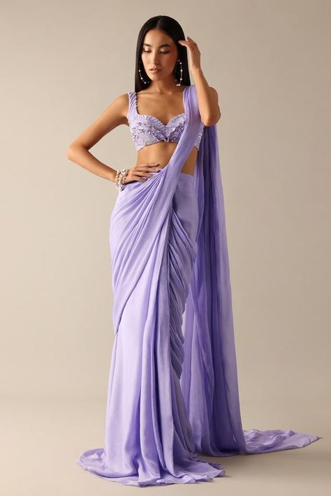 Lilac pre-pleated saree in chiffon base. Comes with a sequins embroidered blouse. Components: 2 Pattern: Embroidered Type Of Work: Sequins Neckline: Sweetheart Sleeve Type: Sleeveless Fabric: Chiffon Color: Purple Other Details:  Closure: Blouse - Back hooks Occasion: Cocktail,Reception - Aza Fashions Purple Haldi Outfit, Pre Pleated Saree, Pleated Saree, Saree Ideas, Draped Saree, Purple Saree, Video Edits, Yellow Saree, Drape Saree