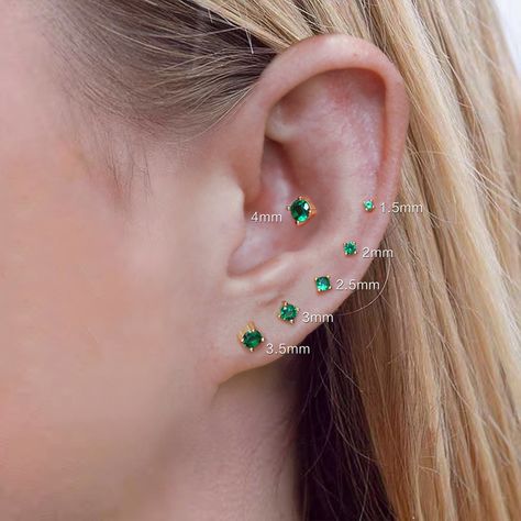 Emerald Stud Earrings & May Birthstone Studs Material: 925 sterling silver, 18k gold plated, AAA Cubic ZirconiaThis earring has an additional protective coating(E-coating)to help it last longer and reduce tarnishing. Sizes: 1.5mm, 2mm, 2.5mm, 3mm, 3.5mm, 4mm Gauge: 20G Style: Minimalist These stud earrings, made from lab-created cushion-cut spinel, are simple in design and striking. They're perfect for everyday wear.The rich green colour shines brightly when the emerald gem is held in four-prong Emerald Stud Earrings, Blue Stud Earrings, Turquoise Hoop Earrings, Rose Gold Earrings Studs, Emerald Earrings Studs, Cartilage Earrings Hoop, Rose Gold Studs, Earrings Round, May Birthstone