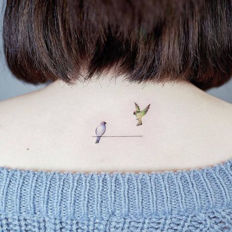 Birds on a wire tattoo on the upper back. Bird Tattoo Neck, Small Bird Tattoos, Bird Tattoo Back, Tiny Bird Tattoos, Tattoo Spots, Small Bird Tattoo, Cool Wrist Tattoos, Ankle Tattoo Small, Back Of Neck Tattoo