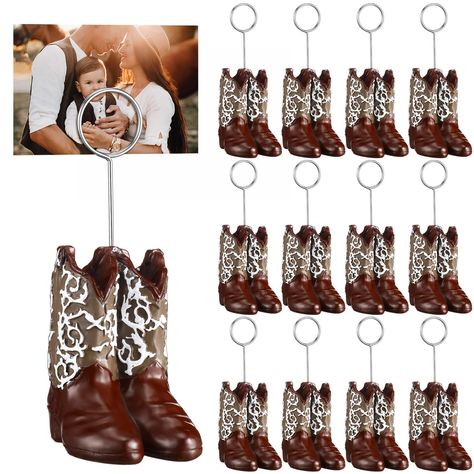 PRICES MAY VARY. Sufficient Quantity: 12 pieces of cowboy boots picture holders in western style, and they are so cute and vivid; The quantity is adequate for your reception table use and daily needs; You don't have to worry about the problem of no replacement Attractive and Exquisite Design: these cowboy boots table number holders have simple and exquisite design, hand painted with patterns, you can also see some wrinkles on the surface, realistic and vintage, adding a sense of beauty; You can Cowboy Theme Party Decorations, Boot Centerpiece, Western Bridal Showers, Cowboy Themed Birthday Party, Boots Photo, Cowboy Theme Party, Table Number Stands, Wedding Anniversary Decorations, Cute Table