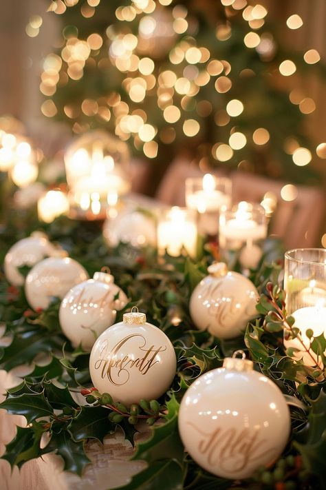 Step into a wedding winter wonderland! 🎄✨ Discover the charm of unique wedding keepsakes with bespoke ornaments featuring the newlyweds' initials. Perfectly nestled amidst evergreen holly and the magical shimmer of fairy lights, these favors are a hit with guests! #WeddingInspiration #WinterWedding #ChristmasWedding #WeddingFavors #CustomFavors #BrideToBe #WeddingDecor #FestiveWedding Winter Wedding Favours Ideas, Christmas Wedding Guest Favors, Winter Wedding Fairy Lights, Wedding Christmas Ornament Favor, Winter Wedding Thank You Gifts, Winter Wedding Favor Ideas, Christmas Themed Wedding Favors, Christmas Ornament Seating Chart, Winter Wedding Party Favors