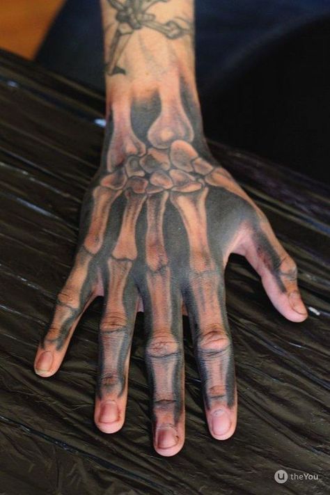 Skeleton tattoos have been around for a very long time, but few people really understand what they mean. We have painted all the options in our article, and the icing on the cake is the 50 best ideas to ink. Bone Hand Tattoo, Skeleton Hand Tattoos, Arm Tattoos For Guys Forearm, Best Neck Tattoos, Bone Hand, Skull Hand Tattoo, Skeleton Tattoo, Rose Tattoos For Men, Bone Tattoos