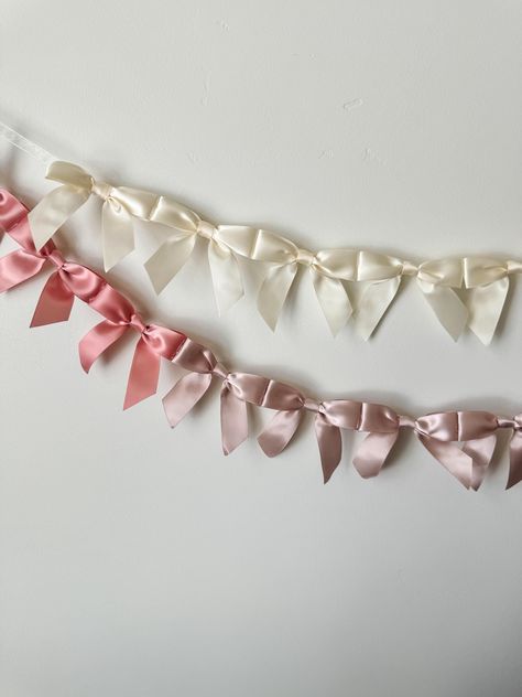 This dainty bow garland is perfect for decoration for any occasion. Use it for bridal parties, bachelorette weekends, baby showers, teen birthday parties, or even to decorate a little girl's room. Each bow is 3.5" wide and is tied off with ribbon on each end for convenient hanging.  Please select your desired length and color when ordering. Further customization available upon request! Just send me a message when ordering and we'll create something beautiful. Returns may be limited for customize Girly Party Decor, Bow Garland, Nursery Baby Girl, Decor For Nursery, Bow Baby Shower, Birthday Party For Teens, Bow Decor, Teen Birthday