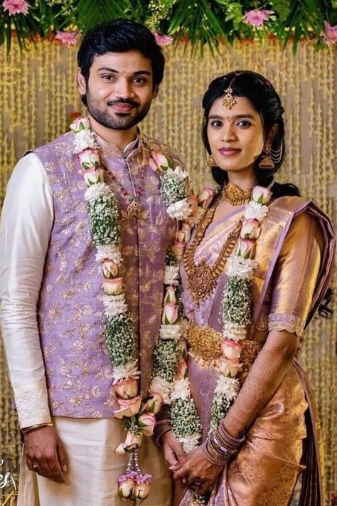 Presenting you latest wedding outfit inspiration for south indian couple. Check out the latest south indian wedding ideas at weddingbazaar.com #weddingbazaar#indianwedding #southindianbrides #silksarees #kanjeevaramsaree #southindiansareelook #southindiansareeblousedesign #southindiansareewhite #southindianweddingoutfitsisters #southindianweddingoutfitgroom #southindianweddingoutfitbridegroom #southindianweddingoutfitformen #southindianweddingoutfitguest #southindianweddingoutfitsaree South Indian Reception Outfit, Engagement Couple Outfits Indian, South Indian Wedding Ideas, Unique Wedding Outfits, Engagement Outfits Indian Couple, Engagement Outfits Indian, Indian Engagement Outfit, Engagement Couple Dress, Engagement Dress For Groom