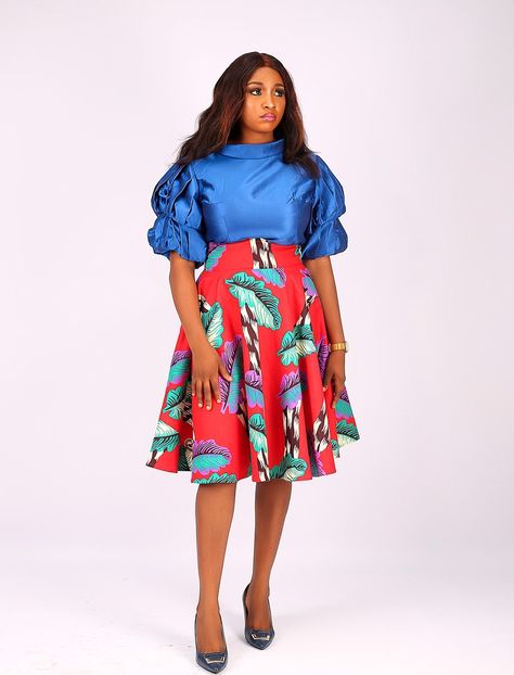 Ankara flare skirt paired with plain mikado blouse Ankara Flare Skirt, Lace Dress Classy, Plain Skirt, White Top Women, Chiffon Kimono, Skirt And Top, Dress Classy, Design Dresses, Skirt And Blouse