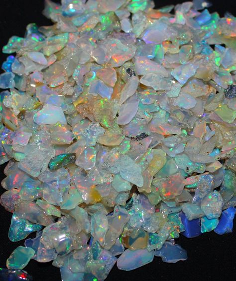 This listing is for AAAA Grade Natural Welo fire Ethiopian Opal slice Rough stones, small grade opal crystals, opal chips, opal slice rough, welo opal rough, fire opal, raw opal Rough stones Stone - Raw Opal polished Chips Rough Mines - Ethiopia Quality - AAAA high grade Size - 5 mm to 12 mm (Approx) We would like to introduce ourselves as we are the eminent sole proprietor of this business, we are the manufacturer of every kind of gemstones including precious, semi precious and cheap stones. We Opal Mineral, Sole Proprietorship, Crystal Chips, Raw Opal, Color Rainbow, Rainy Season, Blue Chalcedony, Welo Opal, Opal Crystal